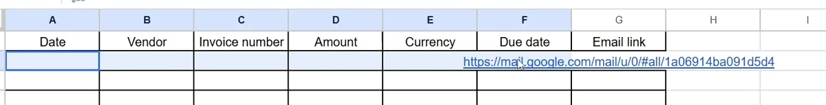 The spreadsheet row with every extracted field empty, only the email link filled in